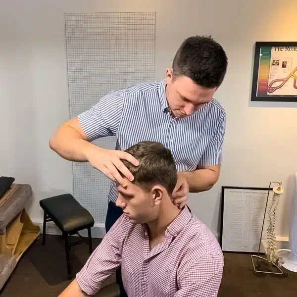 Chiropractor is treating a patient who suffers from neck pain