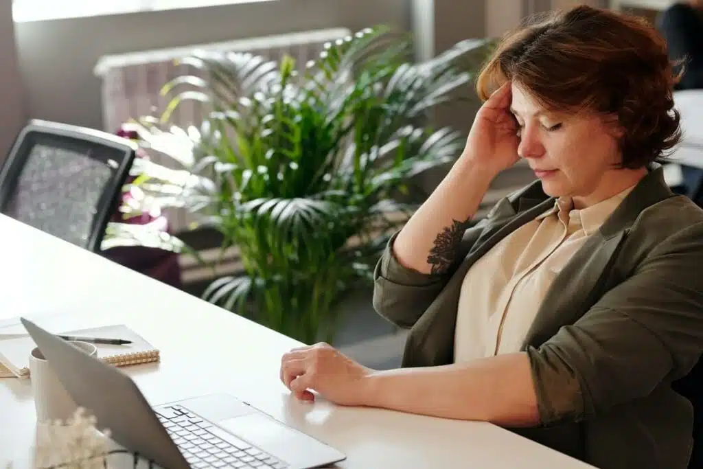 working woman having headache